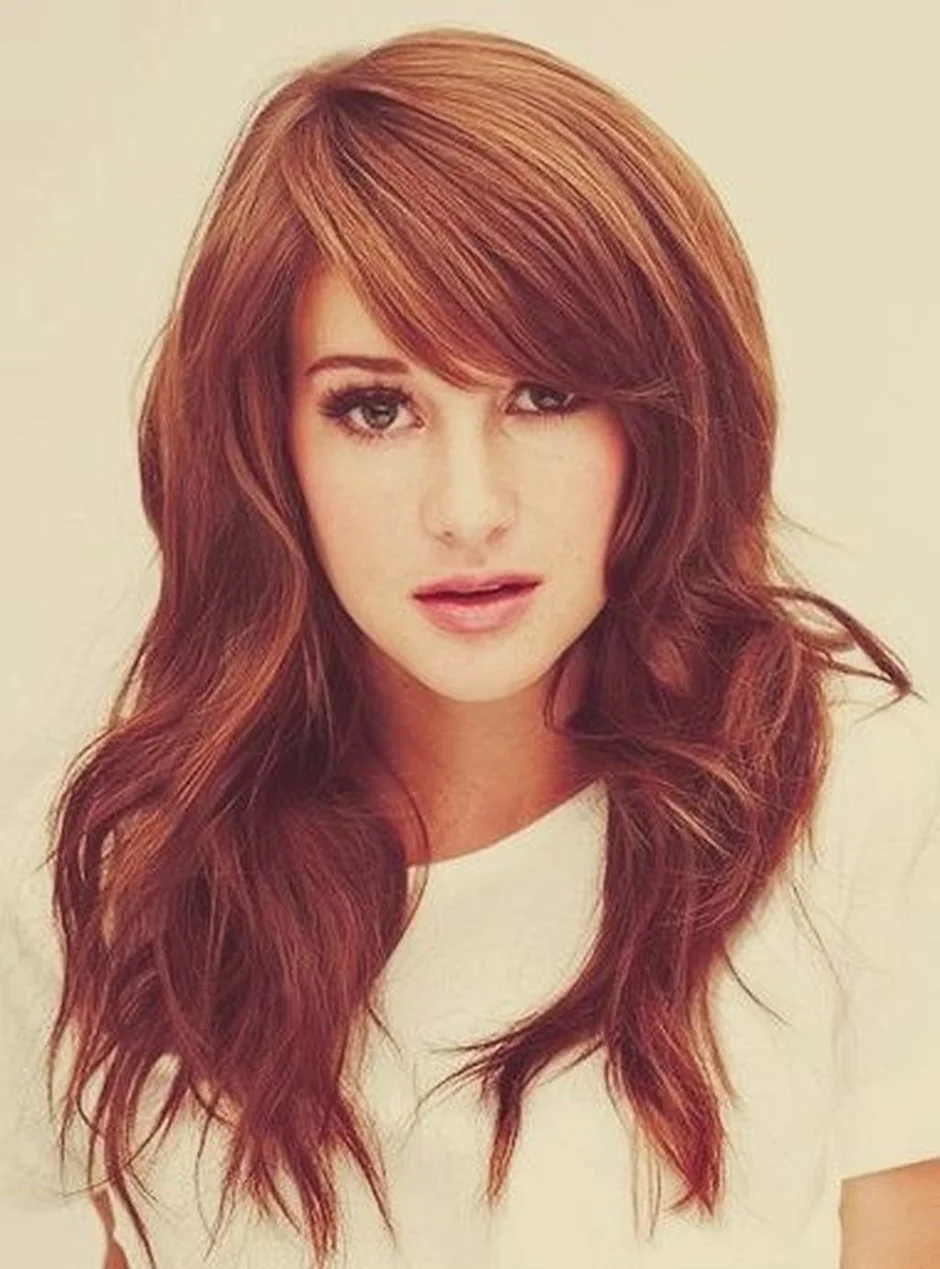 Long fringe to one side